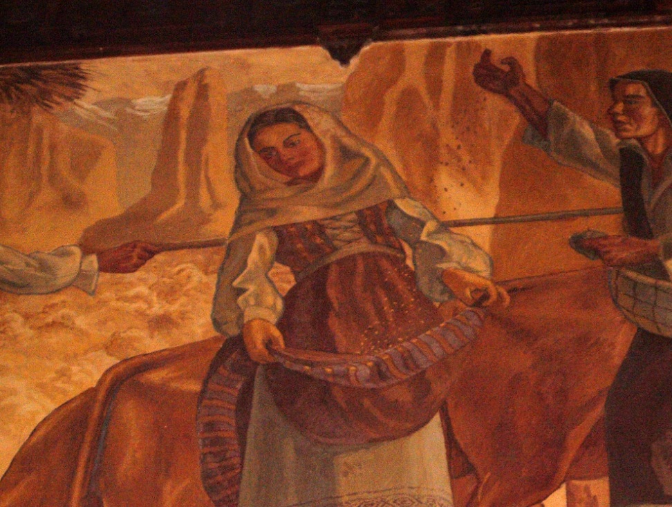 Escena de la recolección, con los burros que dejan sus huellas sobre el camino.